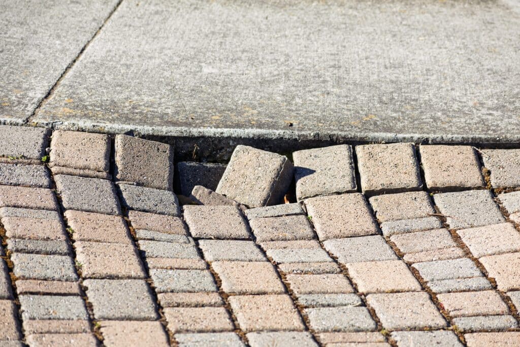 how to repair cracks in a concrete driveway