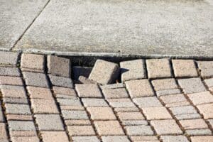 how to repair cracks in a concrete driveway