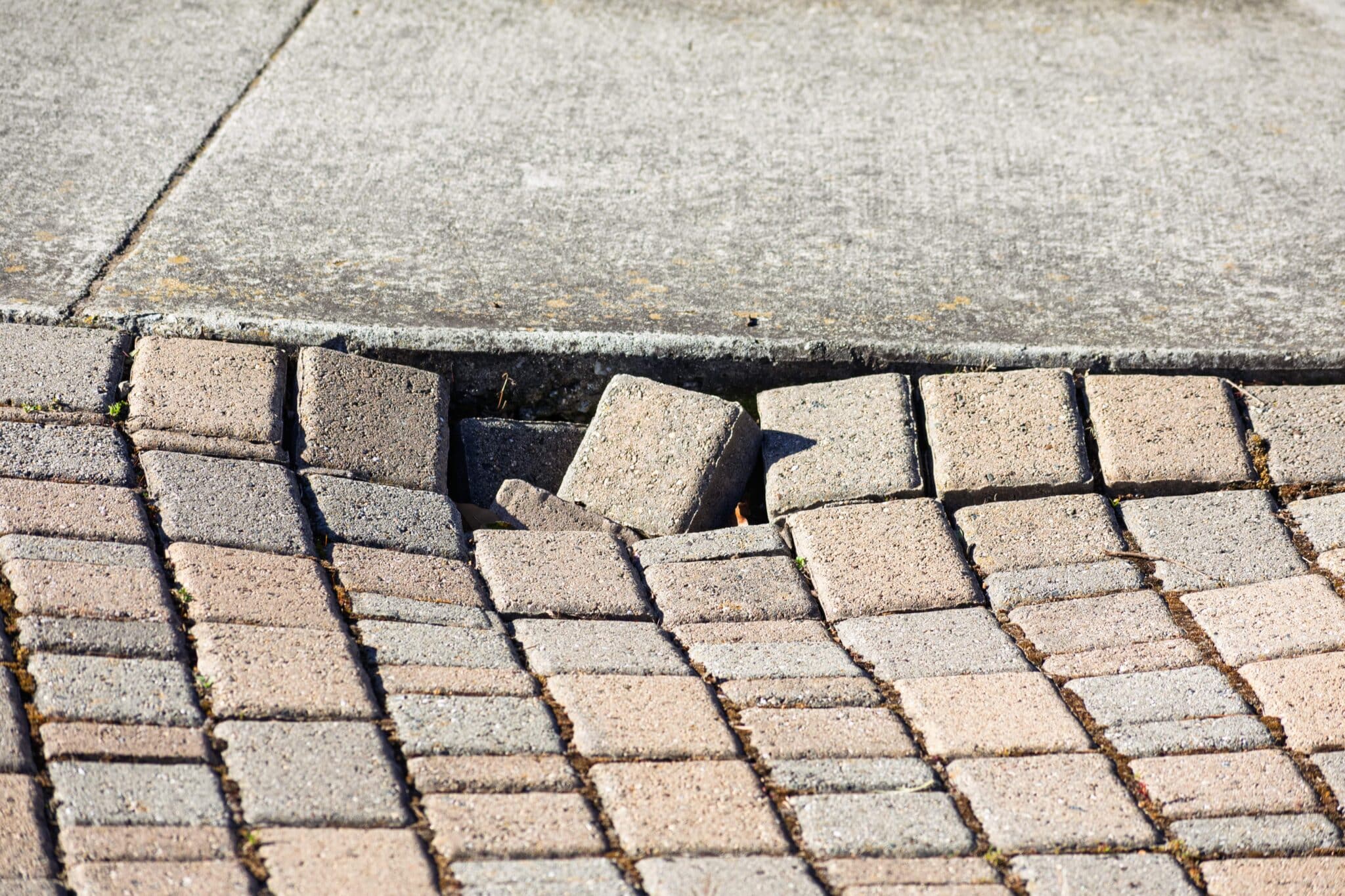 how to repair cracks in a concrete driveway